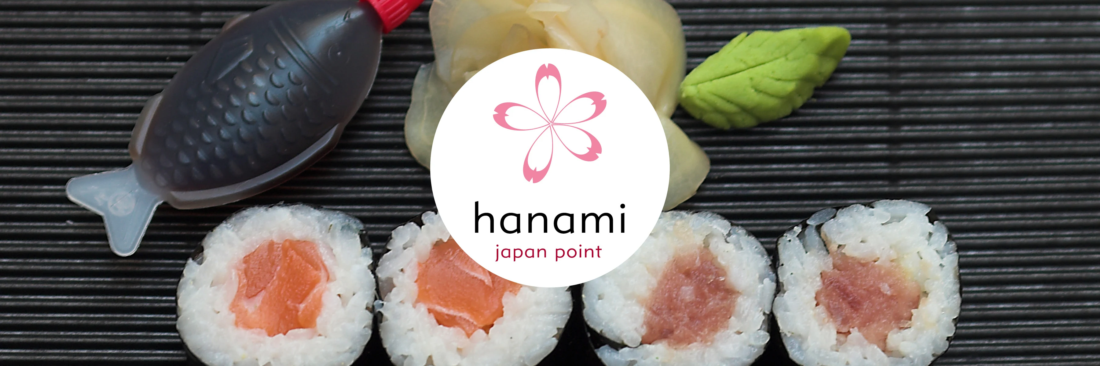 Frisches Maki-Sushi mit Lachs und Thunfisch bei hanami japan point